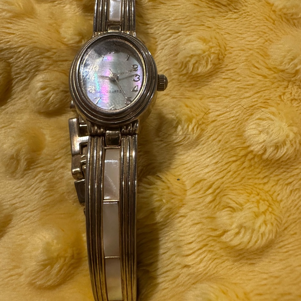 Elegant Gold and White Watch